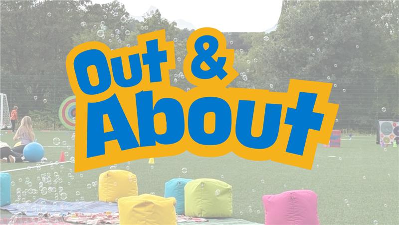 Trivallis Housing Landlord Wales Large yellow and blue text "Out & About" is overlaid on a grassy outdoor scene with bean bags, toys, and bubbles, while children play in the background.